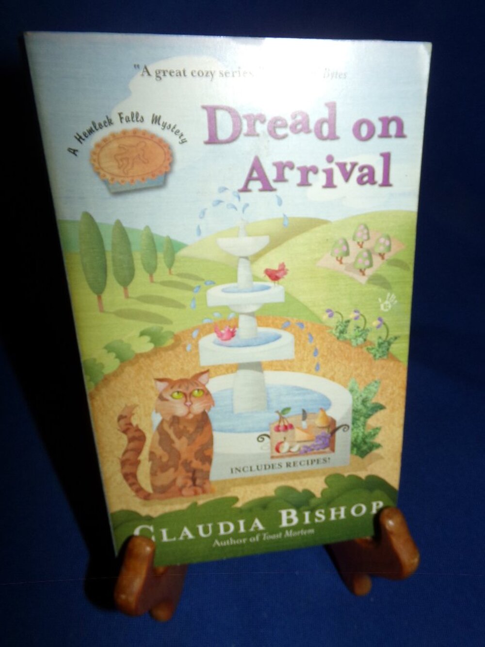 Vintage Paperback Book- Dread on Arrival - Claudia Bishop -Hemlock Falls Mystery